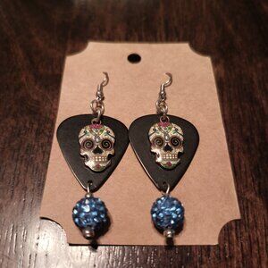 SUGAR SKULLS CHARMS ON BLACK GUITAR PICK EARRINGS
